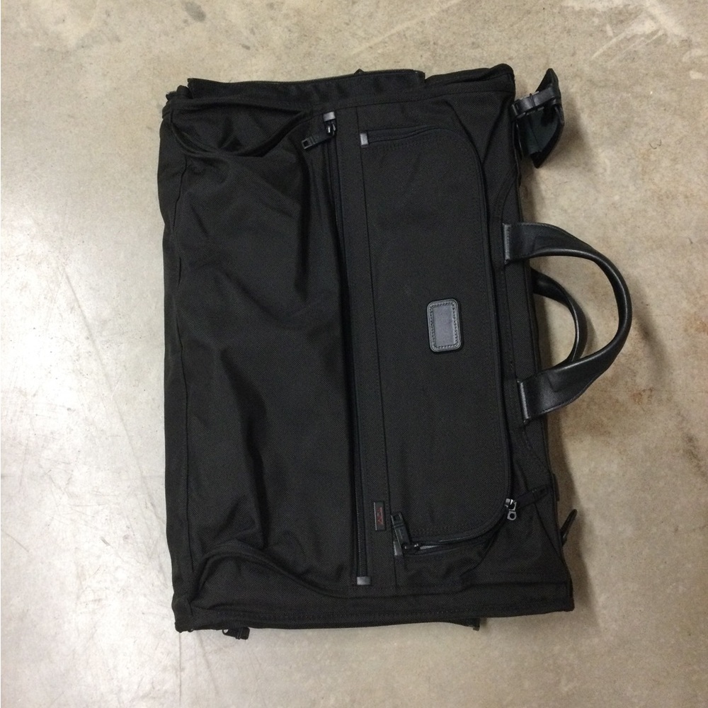 Tumi Black Men's Travel Duffel with Front Zip Pocket and Carry Handles